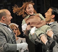 The Warbucks mansion servants (from left, Brian Michael Hoffman, Rebecca Pink and Todd Rhoades) and Annie (Caroline Heffernan). Photo by Liz Lauren