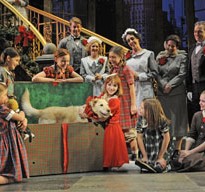 Annie (Caroline Heffernan). Also pictured, orphans surrounding Sandy (Mikey the dog), from left: Marieclaire Popernik, Jaclyn Dougherty, Emma Gordon, Sydney Poss, Haley Noll and Phoebe Ann Paslaski. Back row servants, from left: Liam Quealy, Rebecca Pink, Glory Kissel, Holly Stauder and Larry Adams. Photo by Liz Lauren