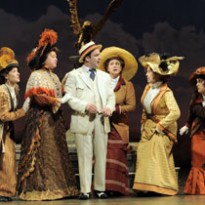 Stef Tovar as Harold Hill and The Music Man cast light up the Paramount stage